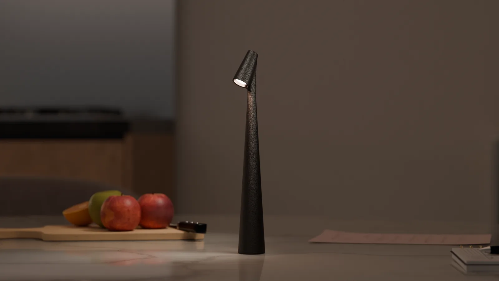 A black cone-shaped lamp glows on a desk beside a laptop and plant, the ChillBeam wordmark overlaid.
