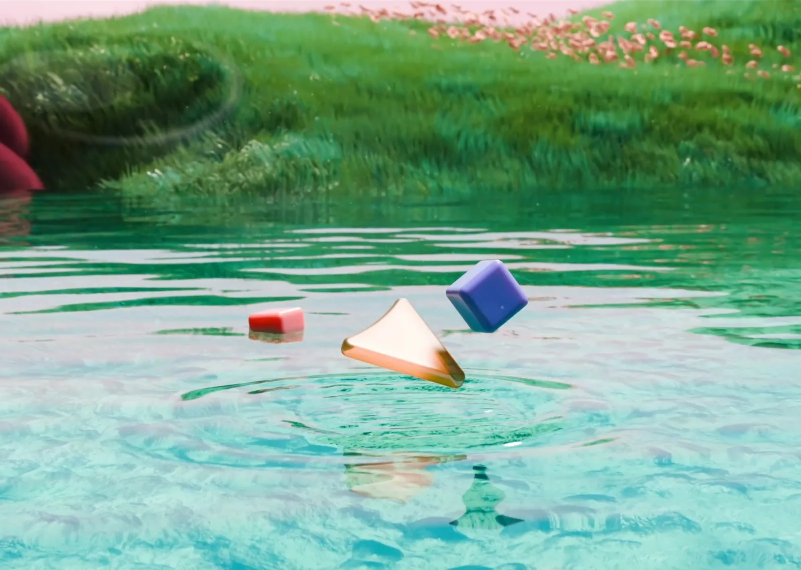 A gold triangle and two coloured cubes hover just above a rippling green pond, pink flowers lining the bank behind.