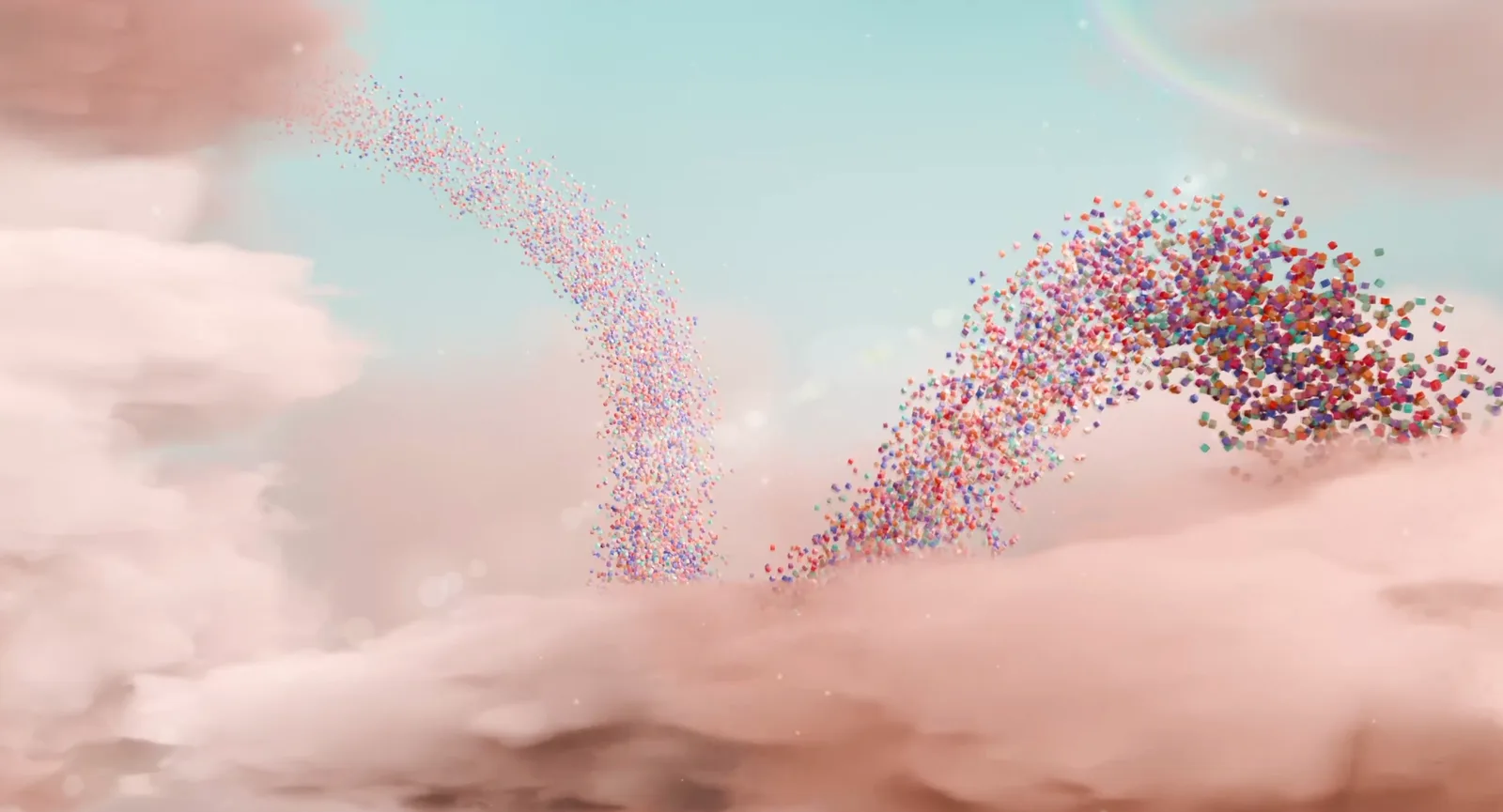 Two ribbons of tiny coloured cubes arc upward through banks of pink cloud.