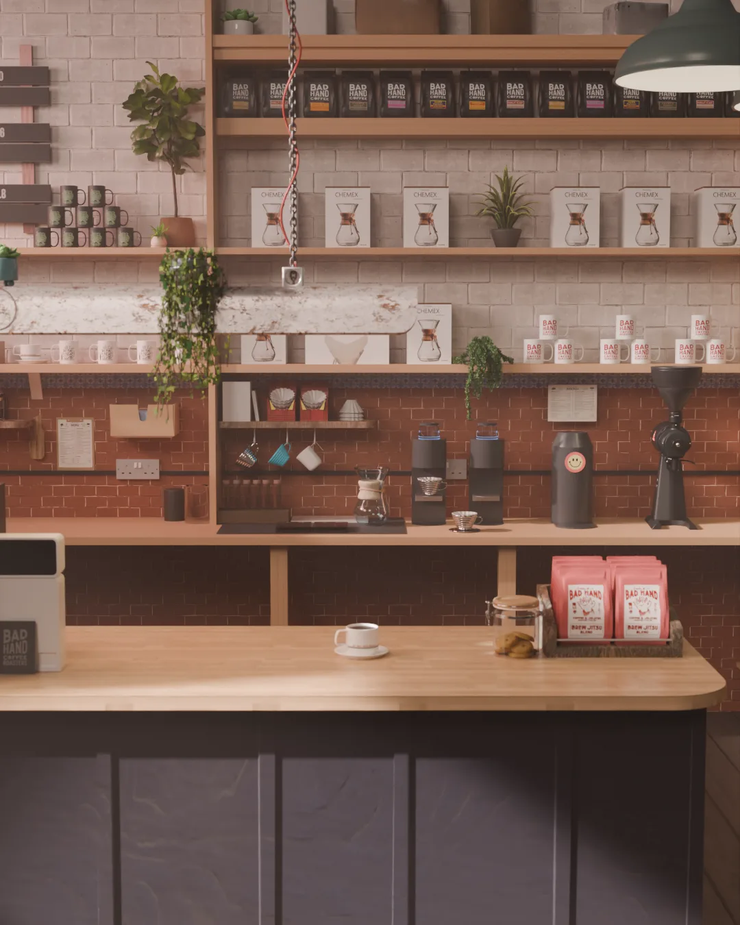 Shelf detail: coffee bags, Chemex boxes and stacked mugs above a counter with cup and grinder.