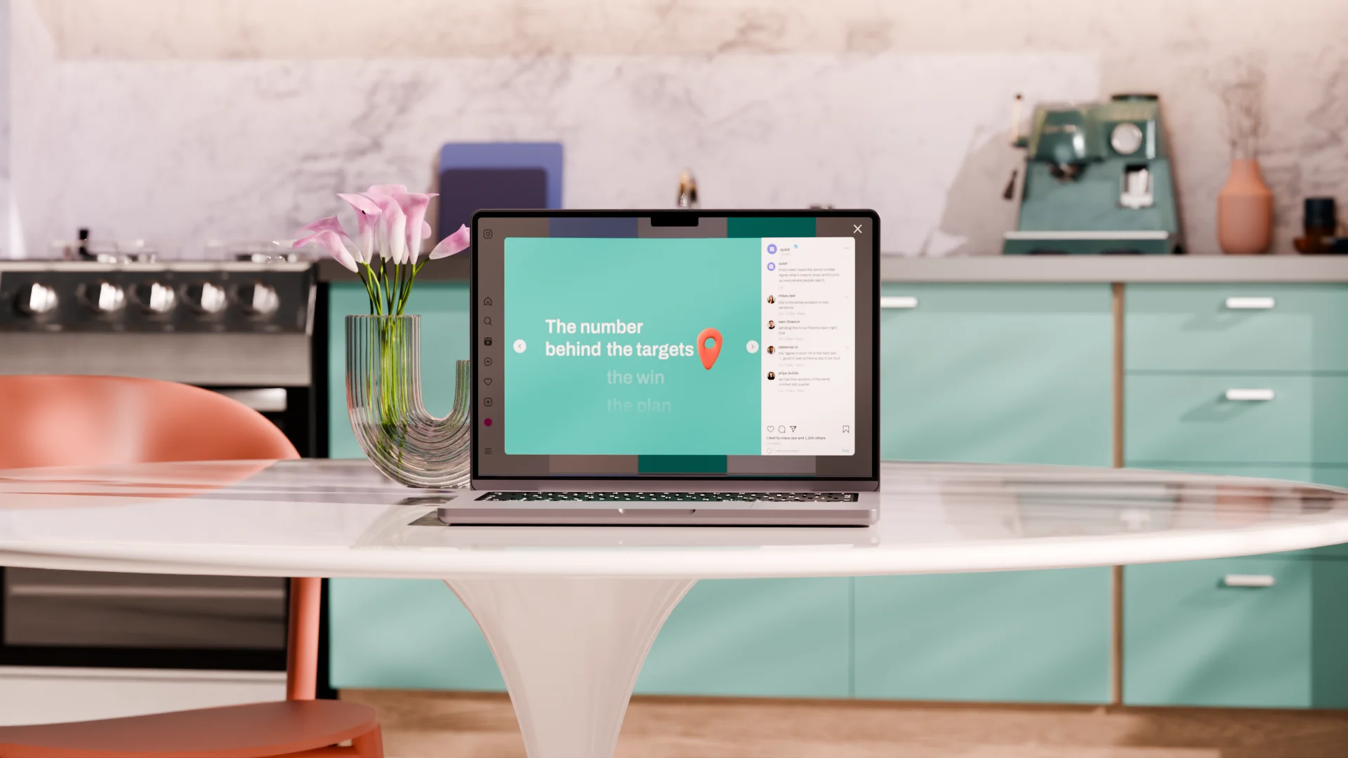 A laptop open on a white tulip table in a mint green kitchen, a Qubit carousel post on screen beside a vase of pink callas.