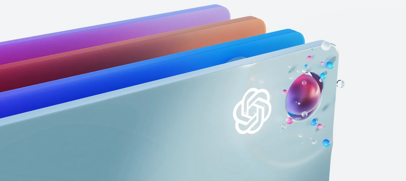 Close edge of a rainbow-layered glass panel, a knotted white logo beside a pink glass orb.